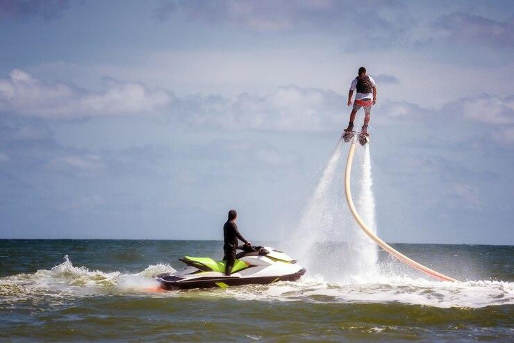 man-posing-water-extreme-flyboard_43430-205